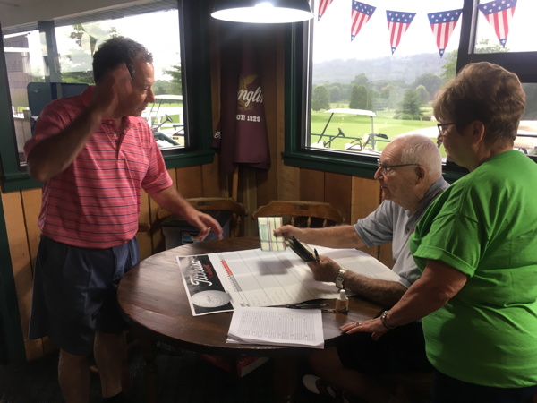 Coach Otto Pritchard & his wife Levina record scores to determine prize winners 